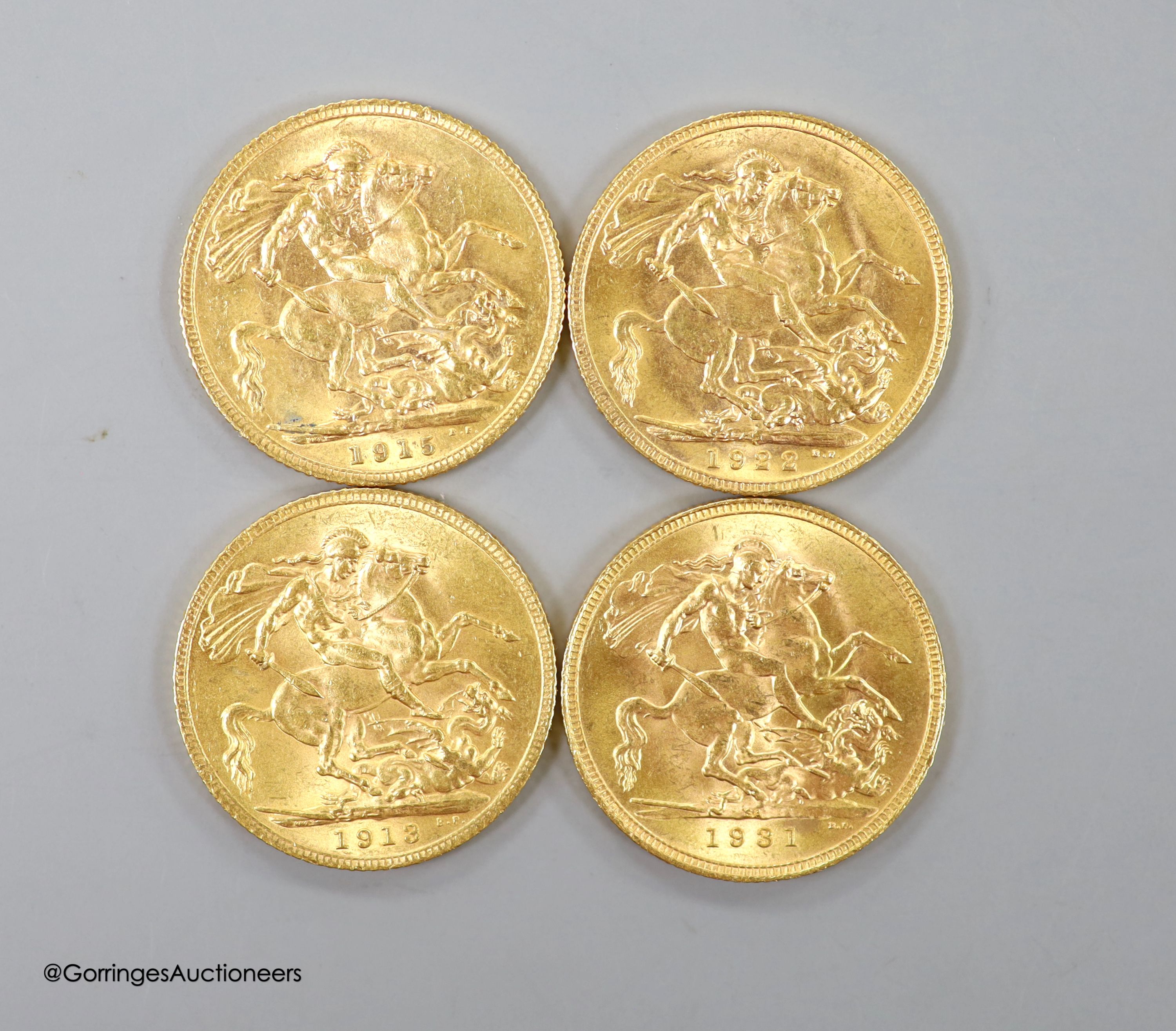 Four George V gold sovereigns, 1913, 1915, 1922P and 1931SA